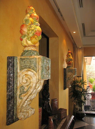 cornice compose of three painted marble effects and painted fruit